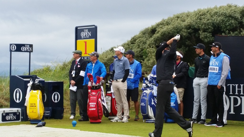 Dustin Johnson surprises even his practice round playing partners hitting a ball onto the beach off the first tee this morning at Royal Troon.