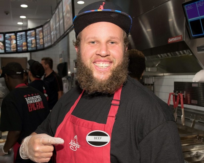 Londoner Andrew 'Beef' Johnston working at Arby's/