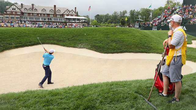 Padraig Harrington plays out of a bunker at his final hole of the 2016 PGA Championship.