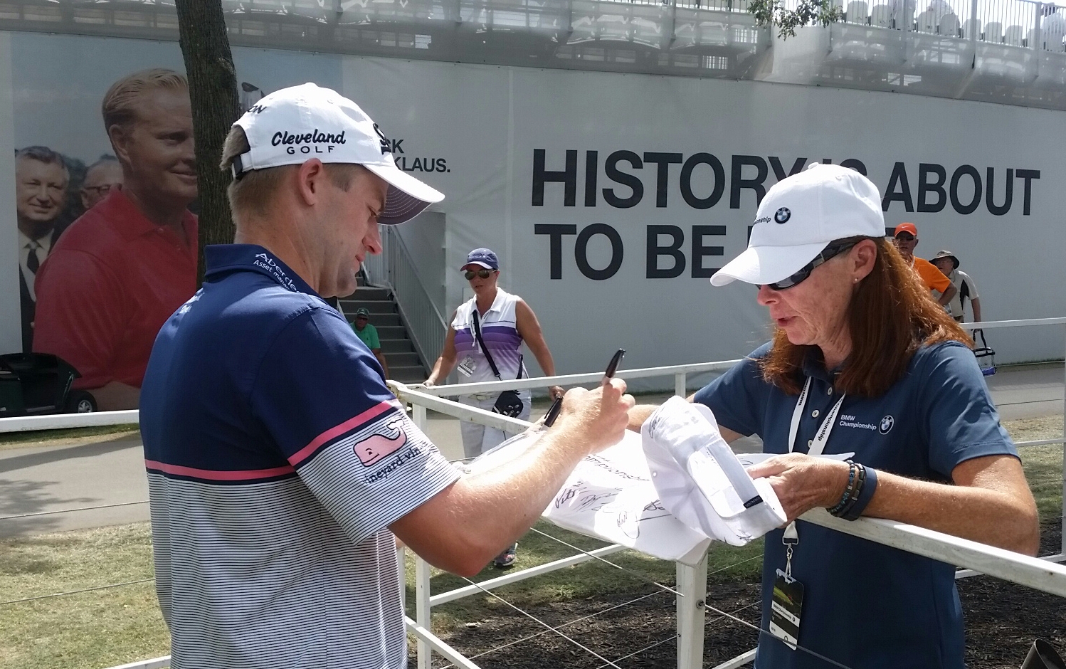 Russell Knox has Jack Nicklaus looking over his shoulder as he signs a few autographs but he's longing to play alongside Tiger Woods. (Photo - www.golfbytourmiss.com)