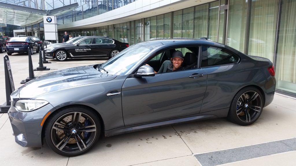 Aaron Baddeley about to leave downtown Indianapolis bound for Crooked Stick GC in a 'flashy' BMW M6 coupe. (Photo - www.golfbytourmiss.com)