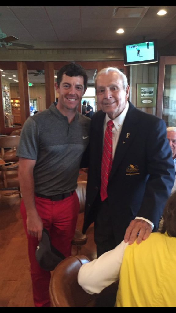 Rory McIlroy and Arnold Palmer.