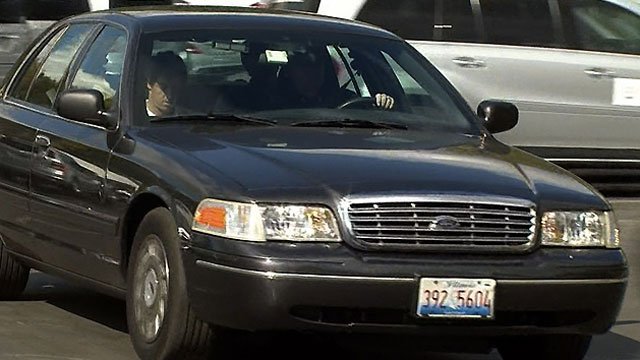 Rory McIlroy in an unmarked Chicago police car on route to the 2012 final round of the Ryder Cup.