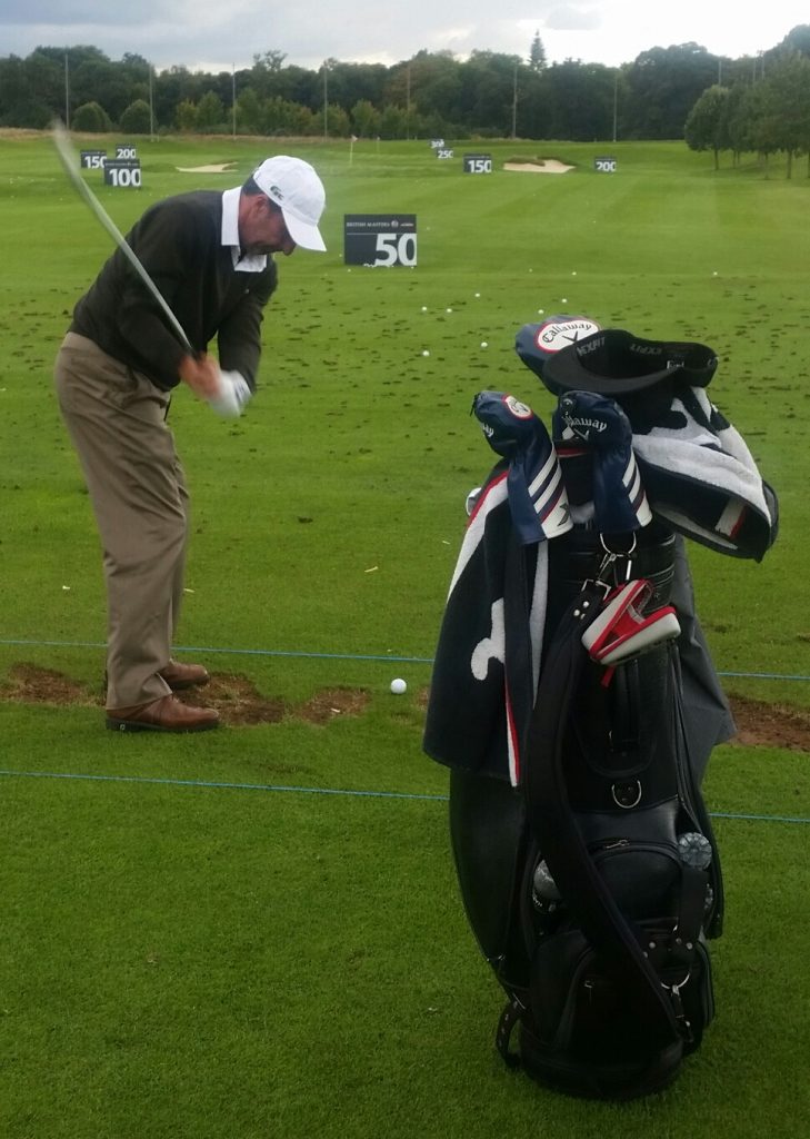 Jose Maria Olazabal begins practicing on The Grove practice range.