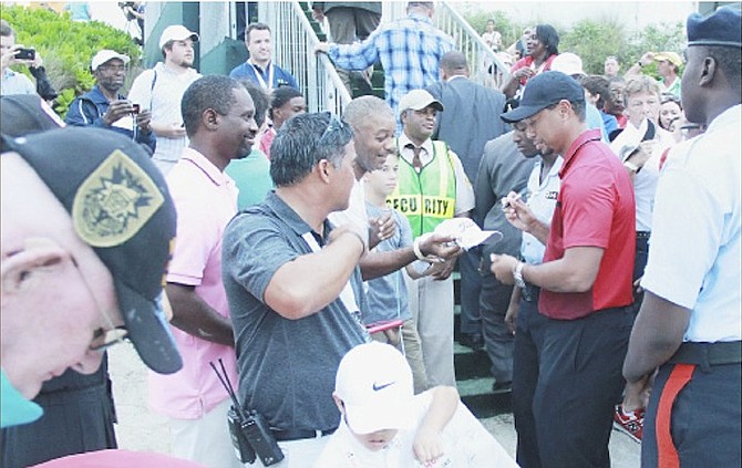Tiger Woods attracts plenty of interest at last year's Hero World Challenge.