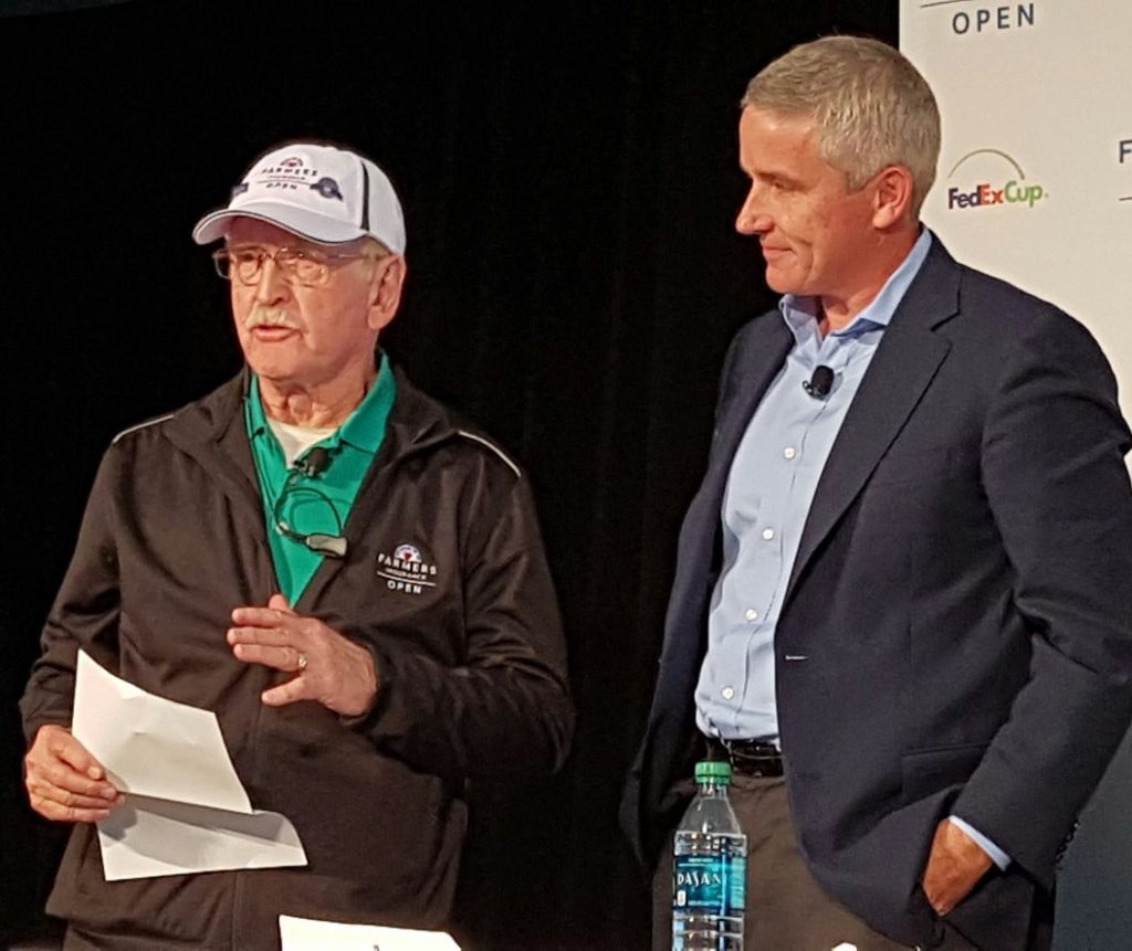 PGA Tour Commissioner Jay Monaghan recognises the efforts of Bob Steber - a 50-year Farmers Insurance Open volunteer.
