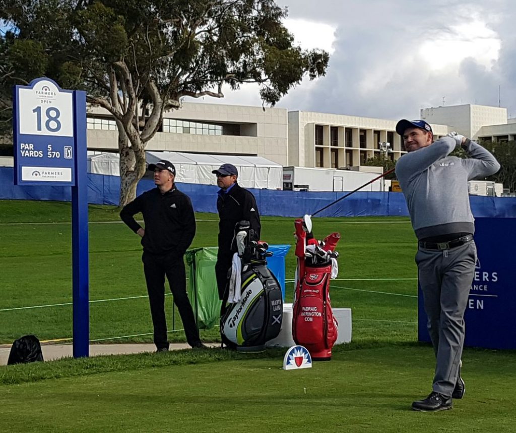 Padraig Harrington drives off the last in practice for the 2017 Farmers Insurance Open as Martin Laird looks on. (Photo - www.golfbytourmiss.com)
