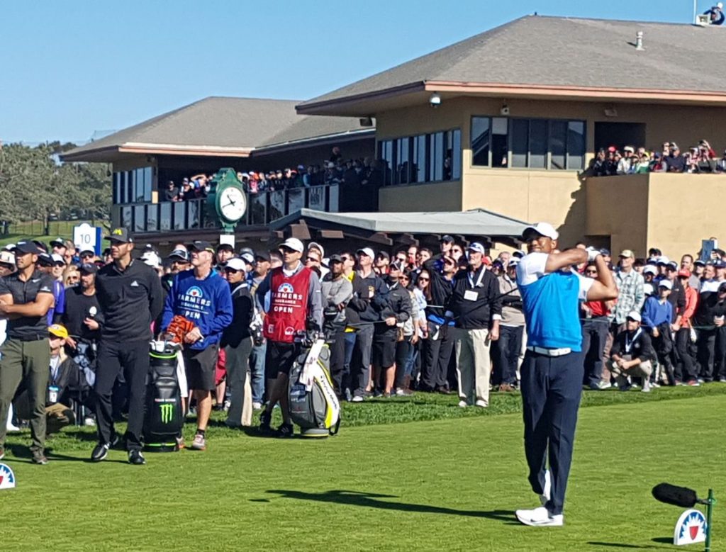 Tiger Woods drives off the first hole of the South Course on day one of the Farmers Insurance Open.