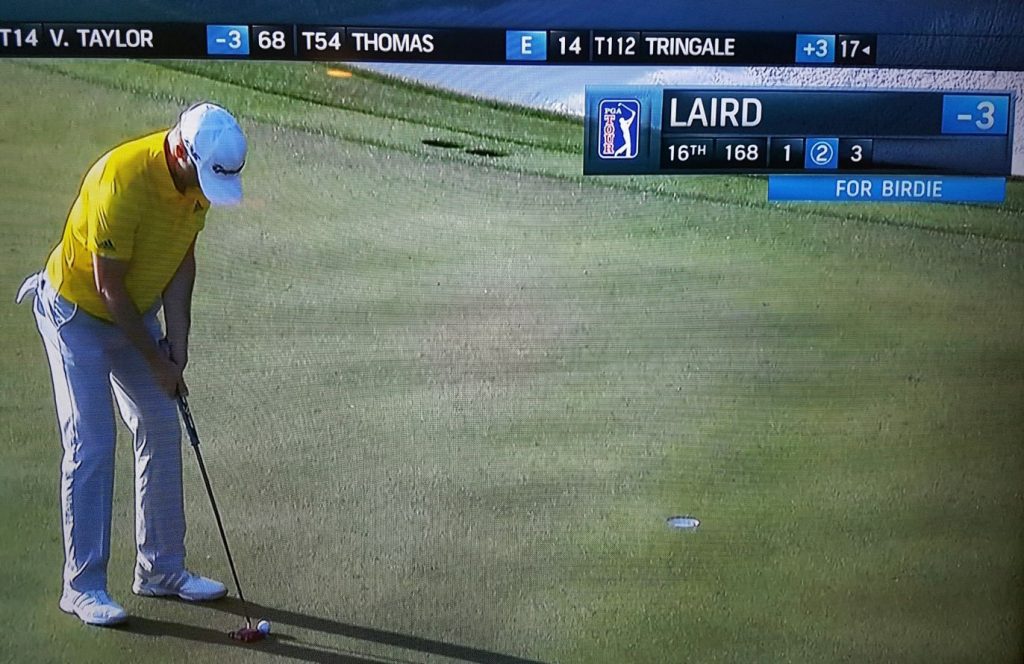 Laird stands over his 6-foot birdie putt on the 16th at TPC Scottsdale