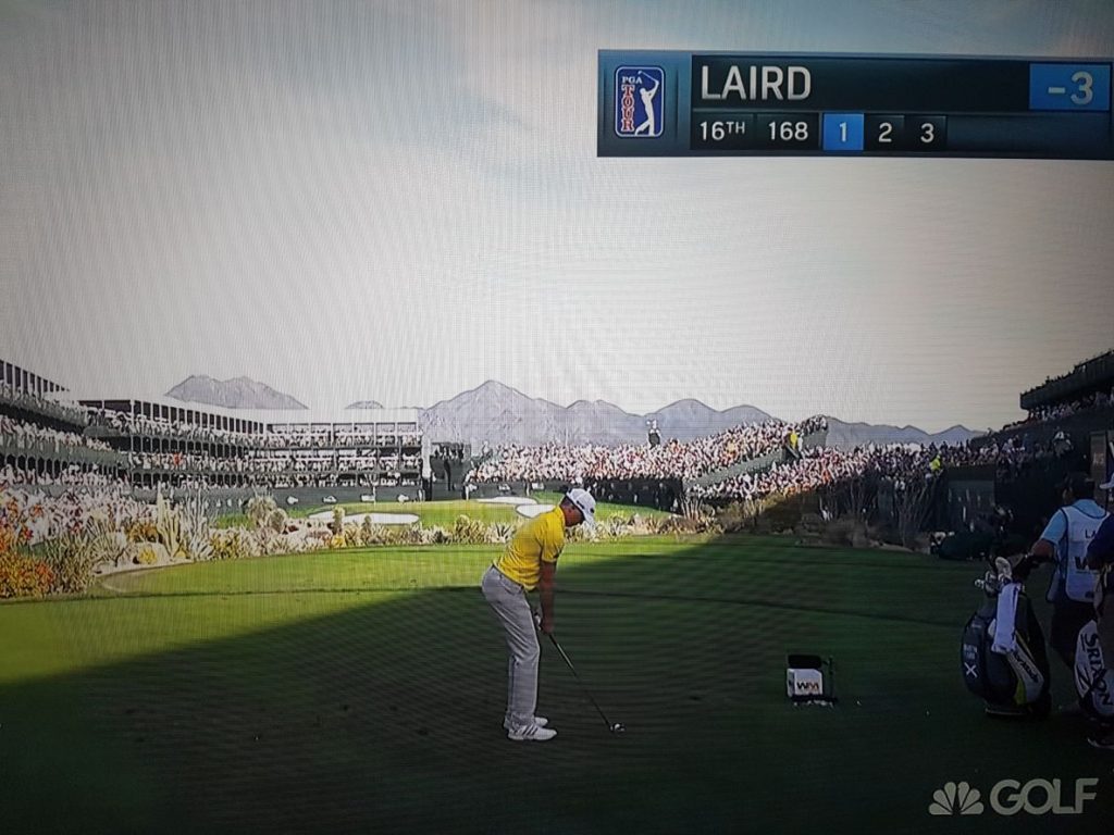 Martin Laird with 8-iron in hand on the 16th hole tee