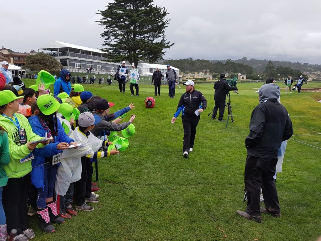 Shane Lowry leaves the course after his round of 70.