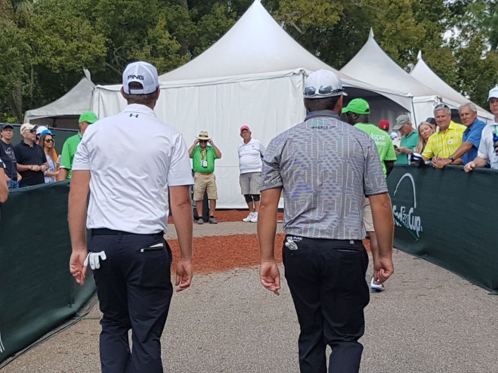 Graeme McDowell and Hunter Mahan heading to the scorer's hut on day two of the 2017 Valspar Championship