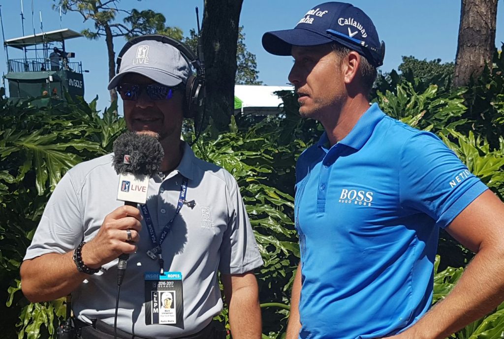 Henrik Stenson waiting to talk to Mark Immelman.