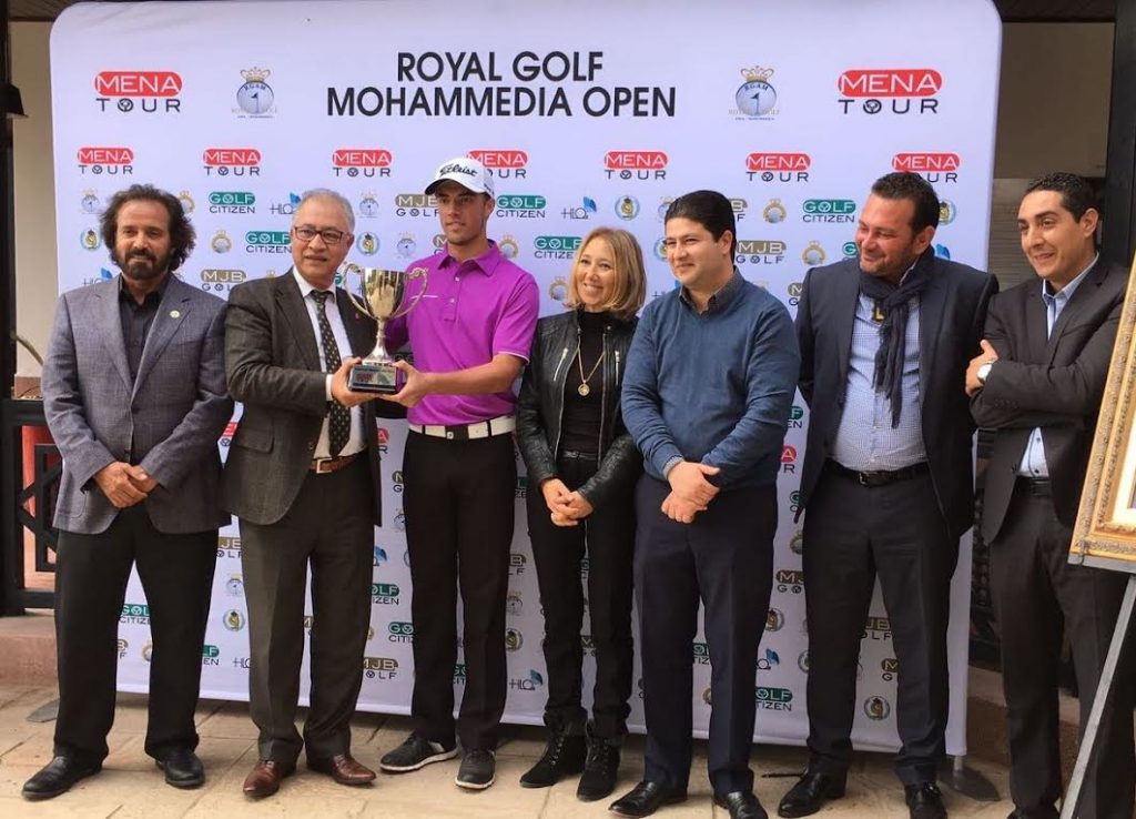 Dutch amateur Pierre Junior Verlaar after receiving the winner’s trophy from Fouad Akasbi, president of Royal Golf D’Anfa and Vice President of the Royal Moroccan Golf Federation.  Reda Bennis, Director General of the Royal Moroccan Golf Federation, Warchan Ali of Royal Golf D’Anfa, Majid Bennis of HLO and Mohamed Juma Buamaim, Chairman of the  MENA Tour, were also present.