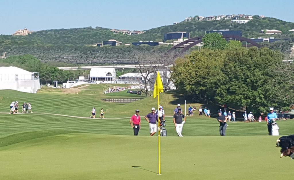 Rory McIlroy chipping into 16 during a practice round on the Austin Country Club course