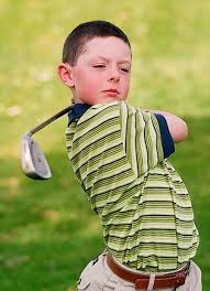 Rory McIlroy aged just six years and already swinging like a pro.